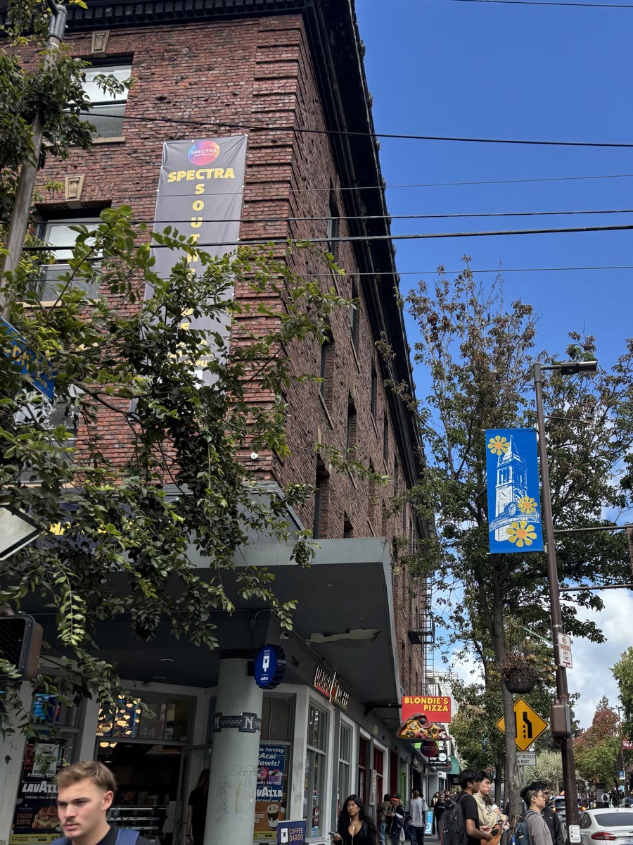 Wider view of the same brick building taken from nearby
